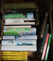 A box of cricket related books