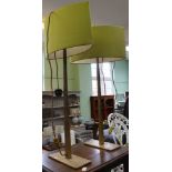 A pair of heavy cast metal gold effect Porta Romana table lamps with shades