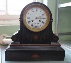 A 19th century black slate mantel clock, with key