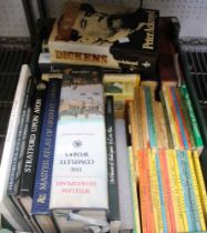 A box containing hard back books including vintage Ladybirds