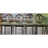 Four 19th century Sheraton style mahogany dining chairs, with upholstered seats