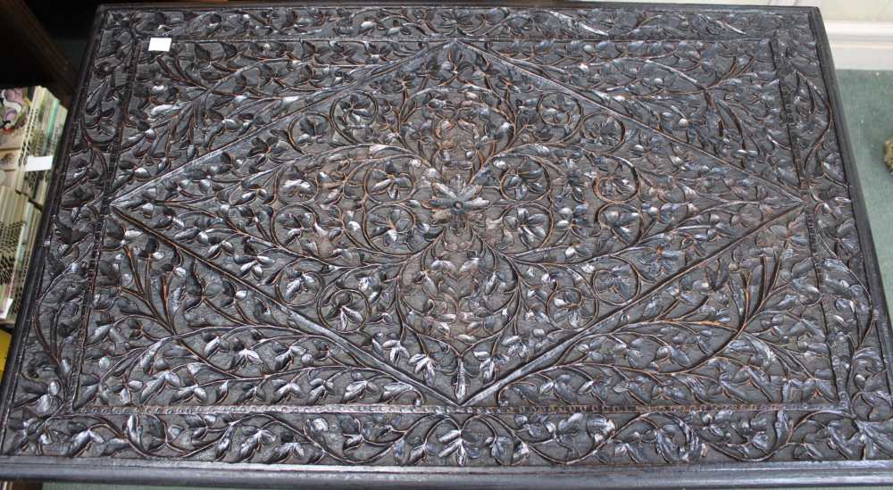 A decoratively carved Anglo / Indian oblong folding campaign table - Image 2 of 2