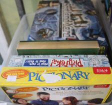 A box containing a selection of board games