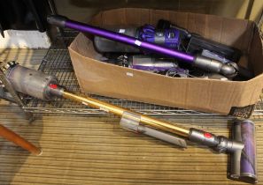 A selection of Dyson handheld vacuum cleaners & fittings