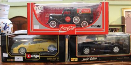 Three 1:18 scale model vehicles a Coca-Cola van, Bugatti EB110 (1991) and a Jaguar XJ220