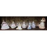 A selection of Coalport porcelain lady figurines (7)