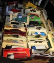 A tray box containing a large selection of model vehicles in original boxes