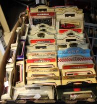 A tray box containing a large selection of model vehicles in original boxes