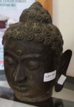 A metal Buddha head