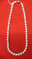 A cultured pearl necklace, fitted 9ct gold ball clasp, 46cm long, in a "Gordon Yates" jewellers of S