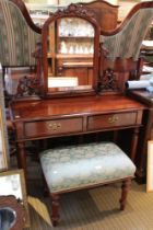 A reproduction dark wood two drawer dressing table with mirror back