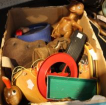 A box containing a quantity of vintage children's toys, ET, metal vehicles, a pull along duck, etc
