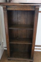 A dark oak small sized three shelf open bookcase
