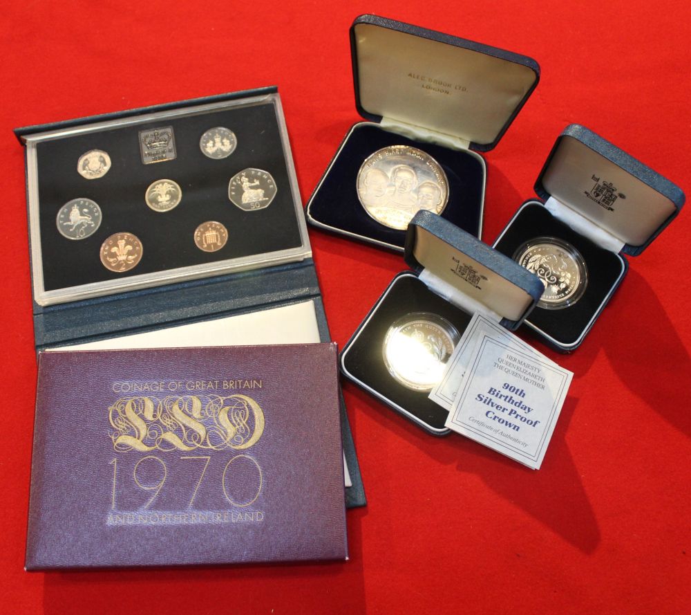 A silver medal "Man's First Moon Landing" Apollo Mission, together with two Queen Elizabeth the Quee