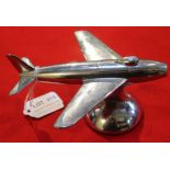 A "Dunhill" chrome table lighter, modelled as a 1954 F-86 Sabre Jet, registered design number 872899