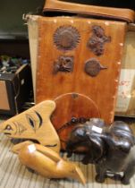Four carved wood items, includes a wall clock, elephant etc (4)