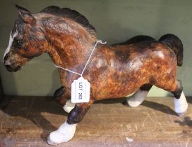 A studio ceramic Heavy Horse figurine, monogrammed "M" 25cm high