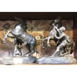 A pair of spelter Marly horses, 25cm high