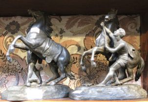 A pair of spelter Marly horses, 25cm high
