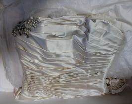 An ivory wedding dress (size 12, may have had alterations) boxed