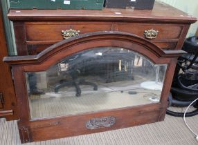 A substantial oak sideboard two small drawers over two large cupboard doors with large arched mirror