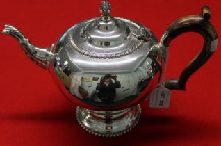 Garrard & Co. A Georgian design silver teapot, cast acanthus leaf decoration to spout, gadrooned rim