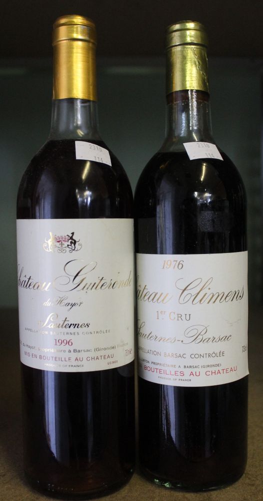 A bottle of Chateau Climens 1976 with a Chateau Guitesonde 1996 (2)