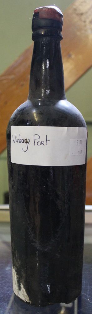 An unspecified bottle of Vintage Port, original wax seal still intact c.1920