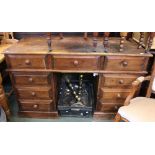 A modern pine pedestal desk