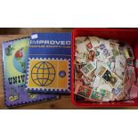 A box of loose stamps together with two stamp albums