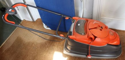 An Easi-Reel electric fly-mo lawn mower