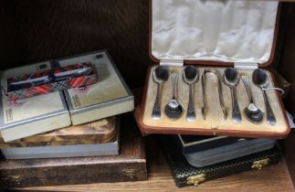 An Edwardian cased set of six silver teaspoons together with sugar tongs, Sheffield 1909, combined w