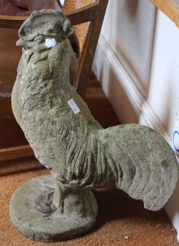 A cast garden ornament in the form of a Cockerel