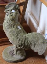 A cast garden ornament in the form of a Cockerel