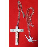 A silver Crucifix, bearing a 9ct gold Christ, on chain, together with a silver Gymnast pendant on ch