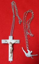A silver Crucifix, bearing a 9ct gold Christ, on chain, together with a silver Gymnast pendant on ch