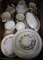 A box containing a quantity of Royal Worcester "Royal Garden" pattern table wares