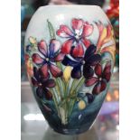 A Moorcroft vase, tube lined and hand painted Lily decoration, painted and impressed factory marks t