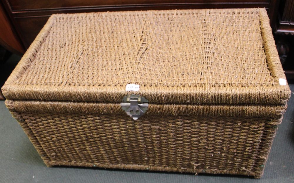 A raffia woven storage trunk