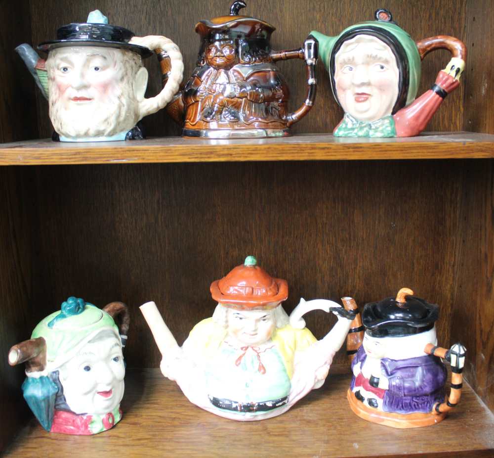 A 19th century Staffordshire pottery "Toby" type splits teapot together with five other figurative a - Image 2 of 2