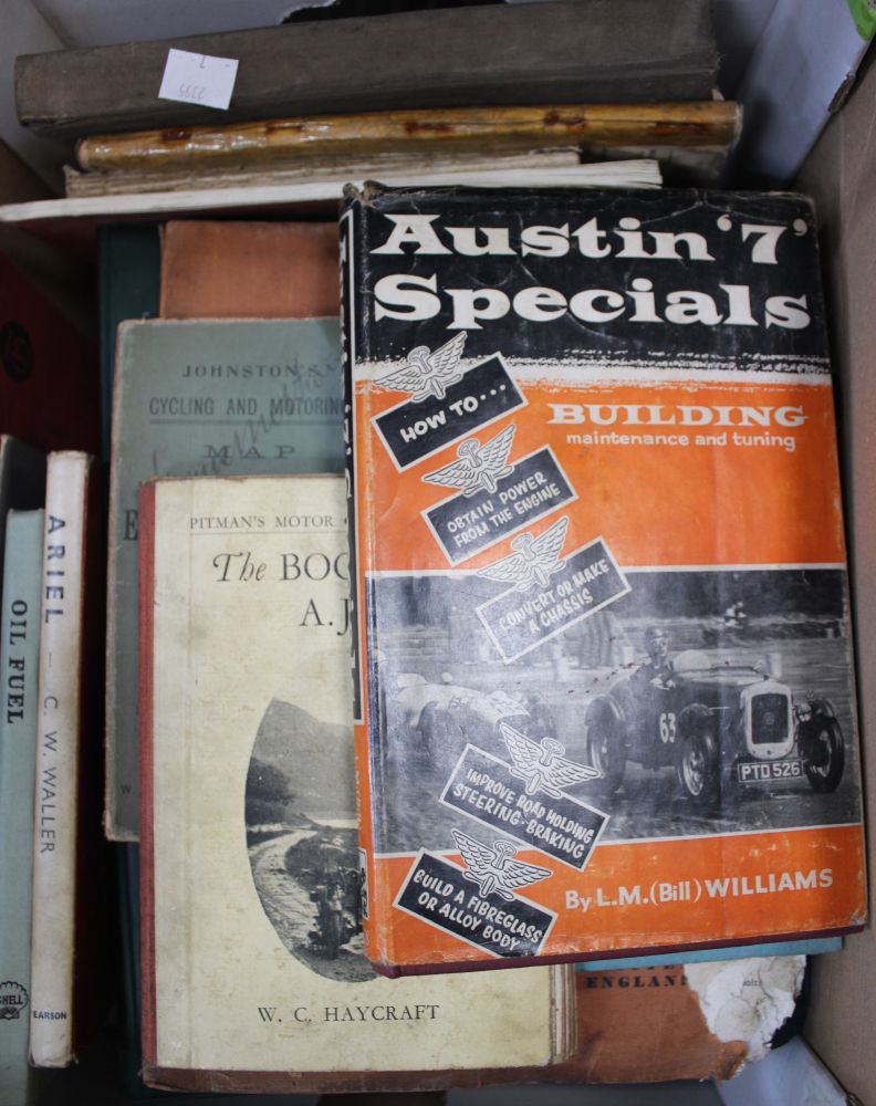 A box containing a quantity of vintage car manuals, hand books, etc