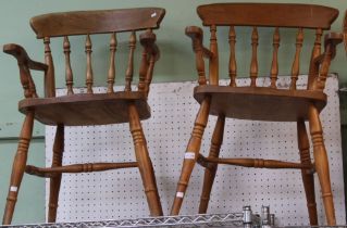 A pair of solid beech kitchen chairs