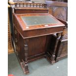 A reproduction mahogany Davenport desk with green inset skiver