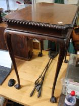 A 20th century mahogany centre table, cabriole legs on ball & talon feet