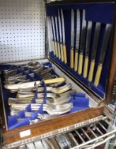 A wooden boxed canteen of cutlery