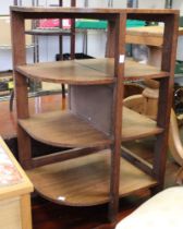 An early 20th century oak, open set of corner shelves