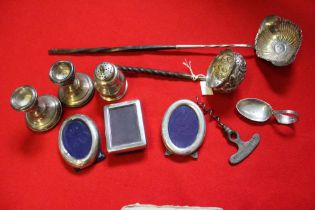 A selection of silver toddy ladles, etc