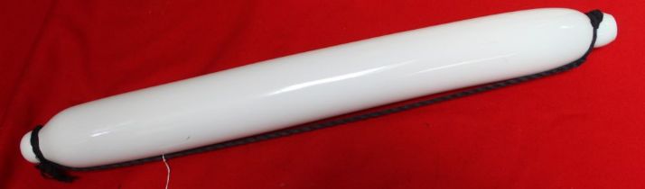 A mid-19th century milk white opaque glass rolling pin, 76cm long