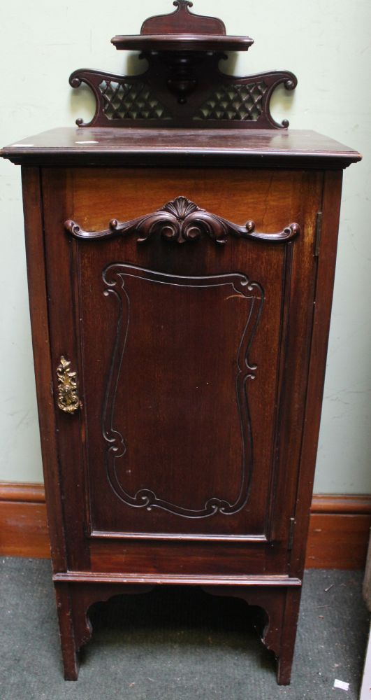 A single mahogany bedside/pot cupboard with rear upstand shelf