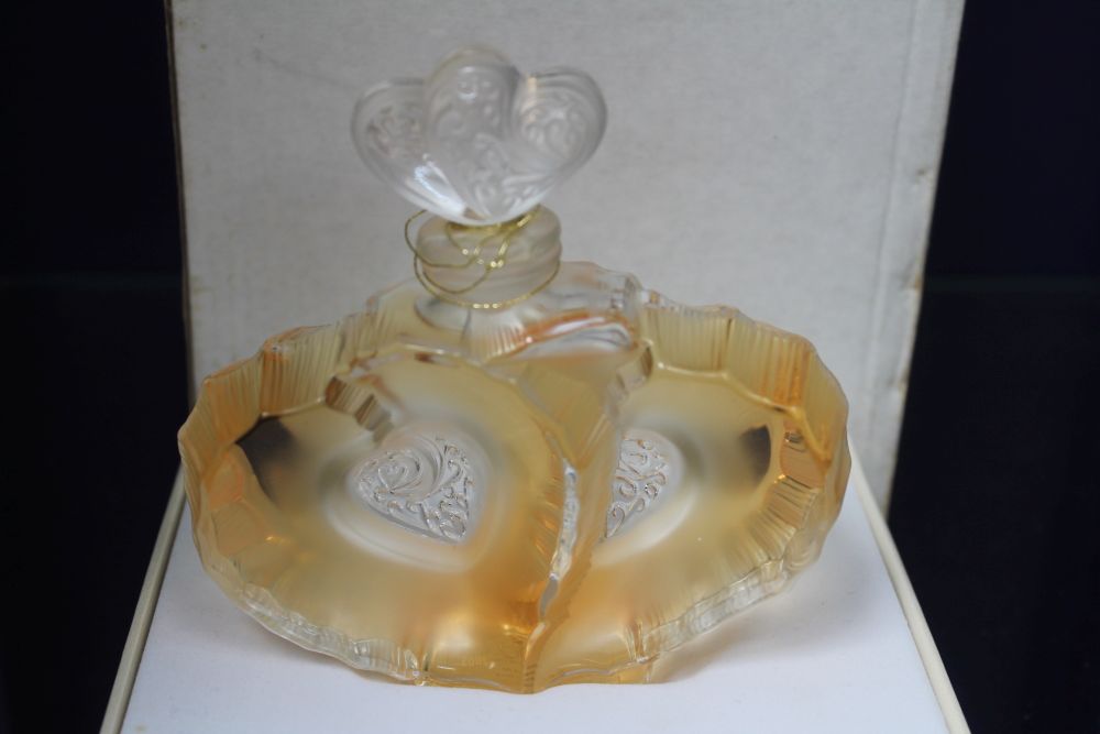 A Lalique perfume bottle, designed as conjoined hearts, still full and in original packaging, with l - Image 2 of 3